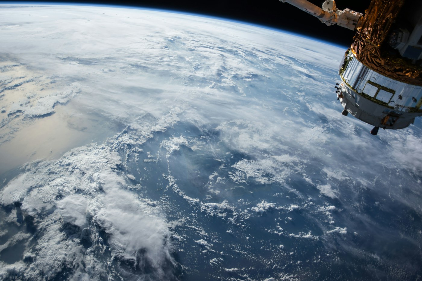 Clouds over the blue Earth, seen from orbit